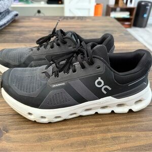 On Running Black and White Athletic Shoes with CloudTec Cushioning
